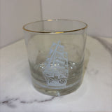 glass with white ship