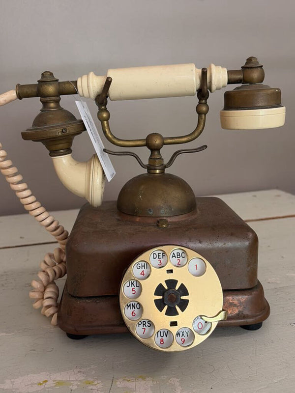 vintage brass rotary phone