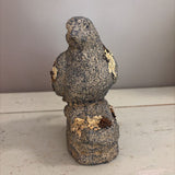 mossy resin bird statue