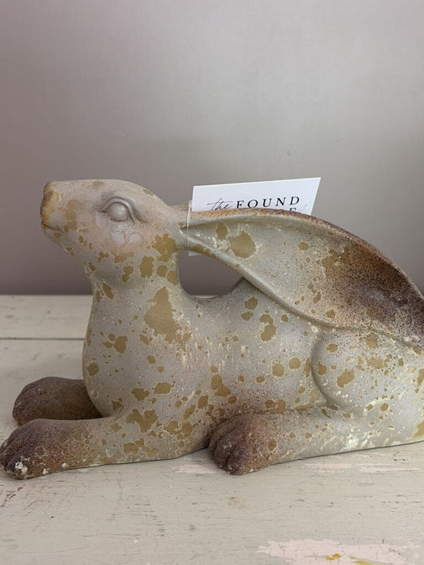 laying distressed bunny