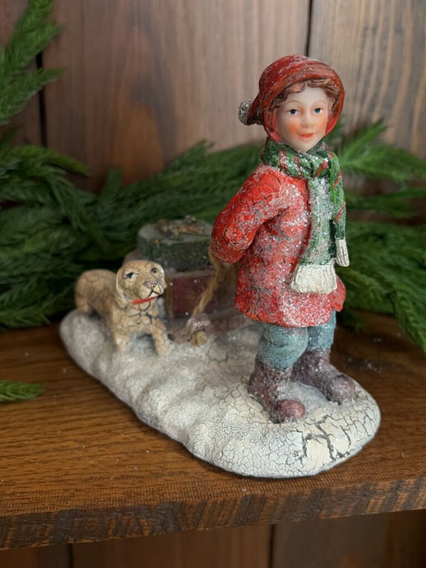 girl with sled and dog
