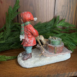 girl with sled and dog