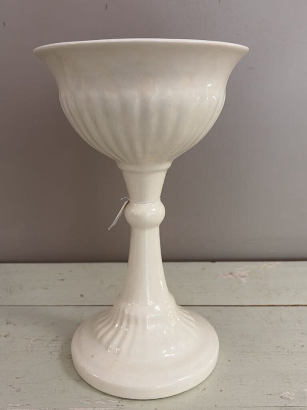 tall white ceramic plant stand