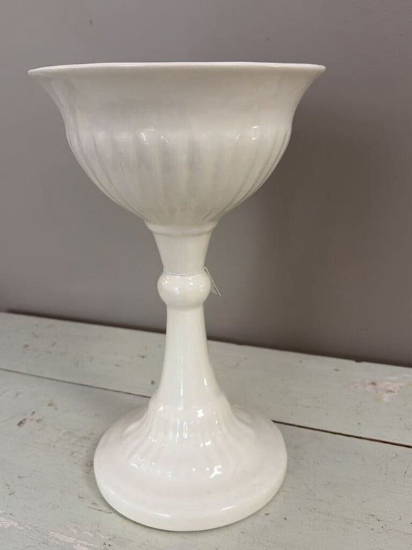tall white ceramic plant stand