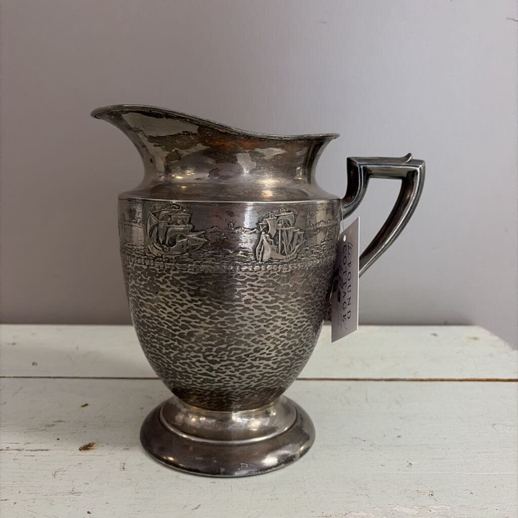 silver sailboat pitcher