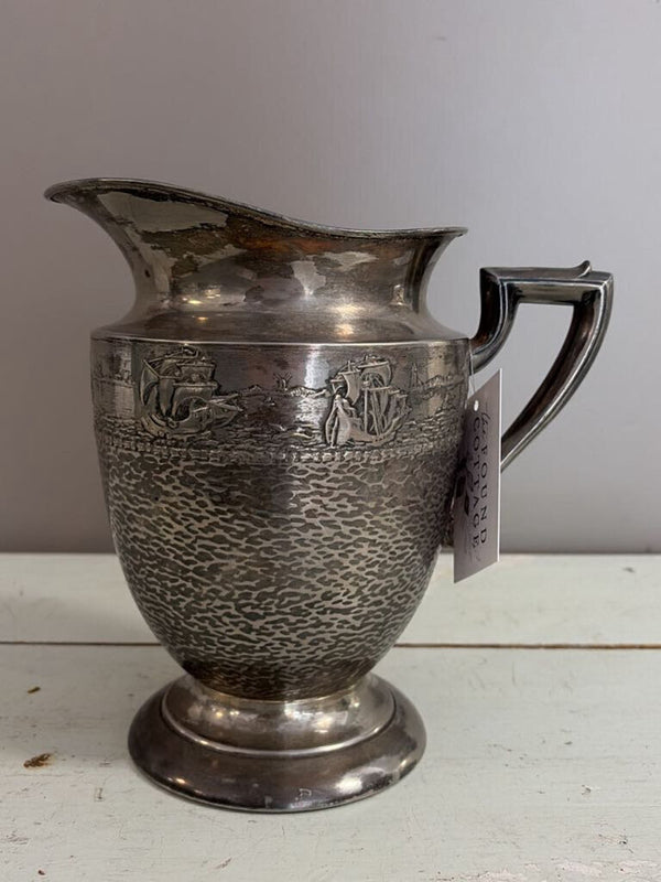 silver sailboat pitcher