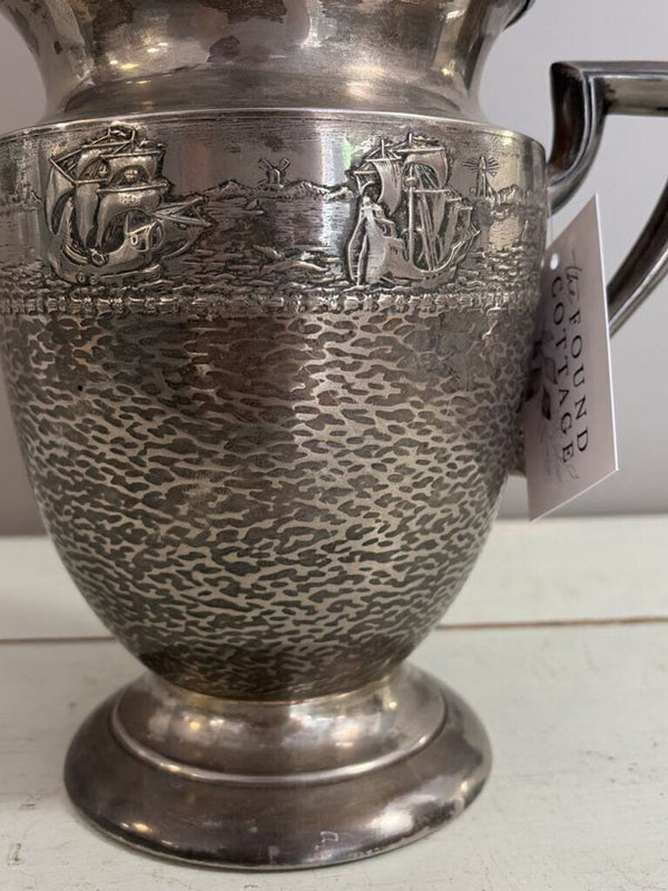 silver sailboat pitcher