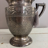 silver sailboat pitcher