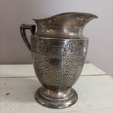 silver sailboat pitcher