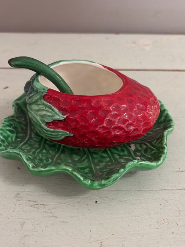 strawberry dish with spoon