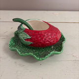 strawberry dish with spoon