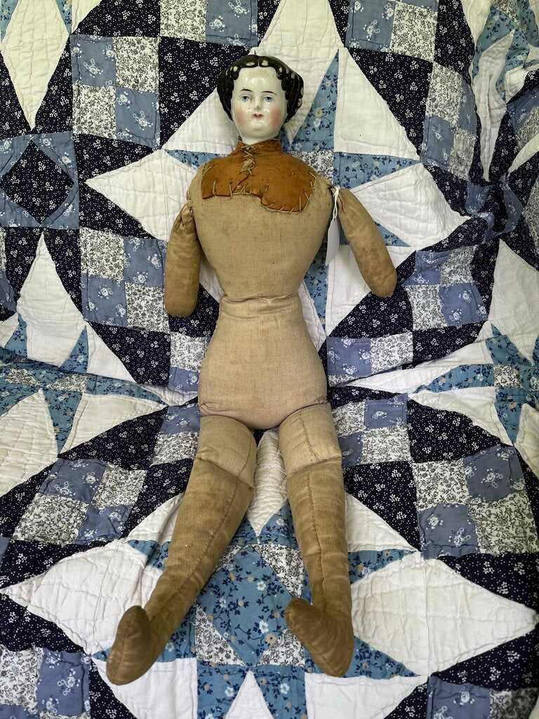 Antique doll with porcelain head