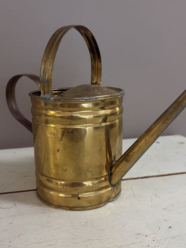 small brass watering can