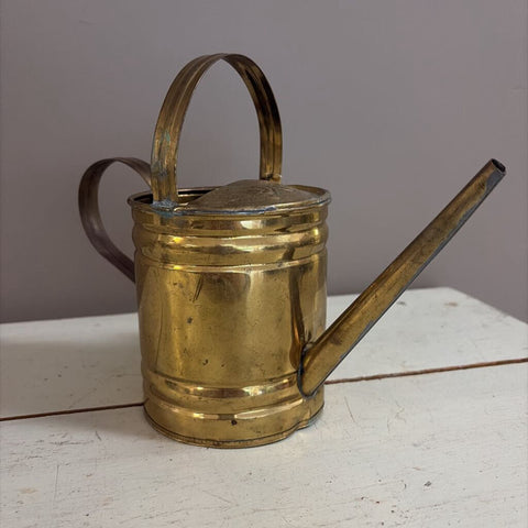 small brass watering can