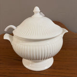white tureen bowl with lid and spoon