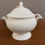 white tureen bowl with lid and spoon