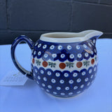 Polish pottery pitcher with sprig pattern