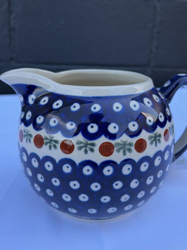Polish pottery pitcher with sprig pattern