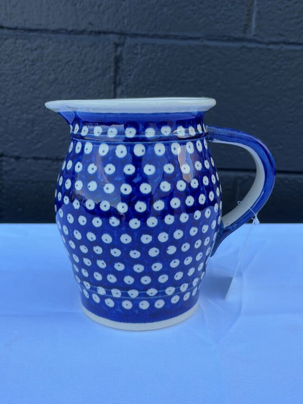 Polish pottery blue and white dot pattern pitcher