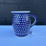 Polish pottery blue and white dot pattern pitcher