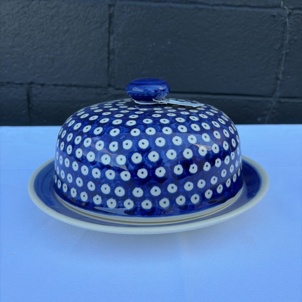 Polish pottery plate with cover in a blue and white pattern