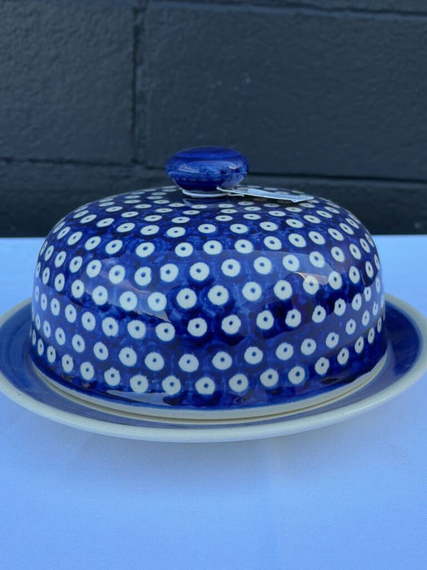 Polish pottery plate with cover in a blue and white pattern