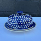 Polish pottery plate with cover in a blue and white pattern