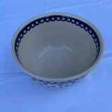 Polish pottery medium mixing bowl with blue dots