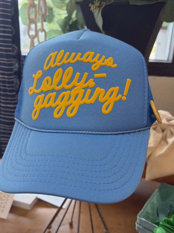 cobalt always lollygagging trucker hat with yellow font