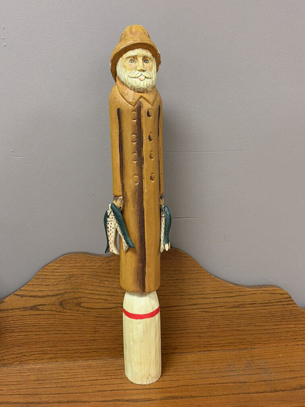 tall wooden sea captain