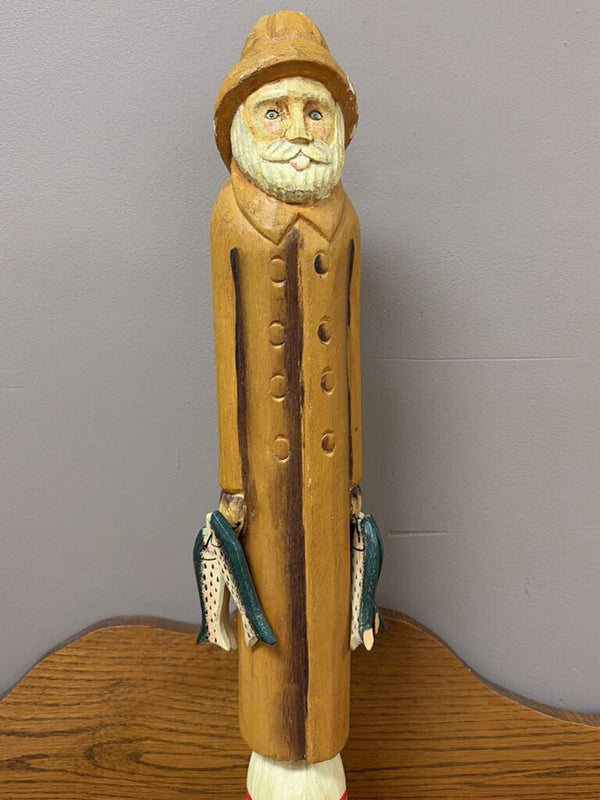 tall wooden sea captain