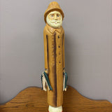 tall wooden sea captain