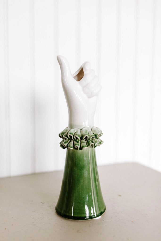 green stoneware hand vase with ruffled shirt